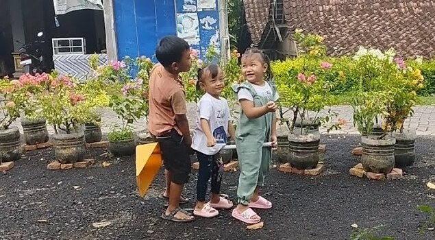 Playing with the older siblings